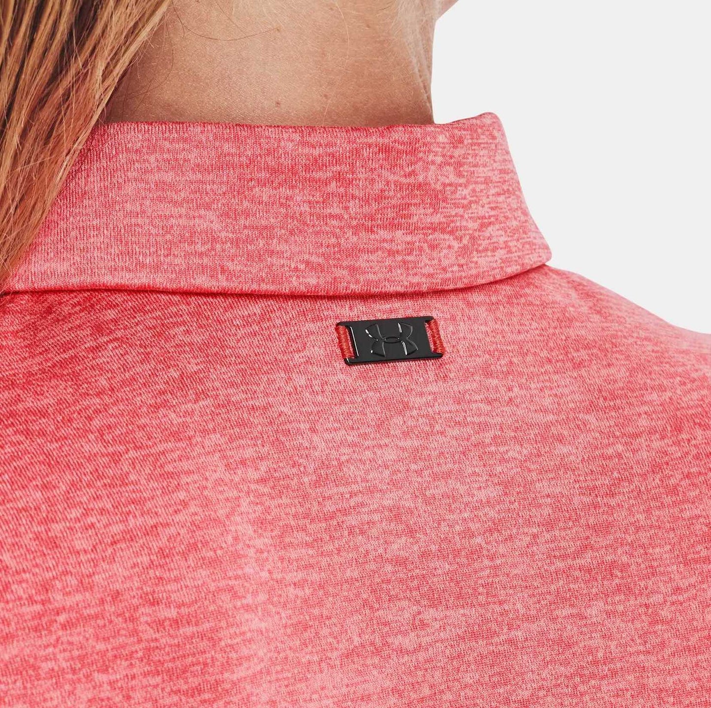 Polo de golf femme under armour à manche courte corail rose